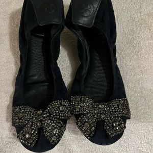 Tory Burch flats. So 8.5 in navy blue with rhinestone bow tie